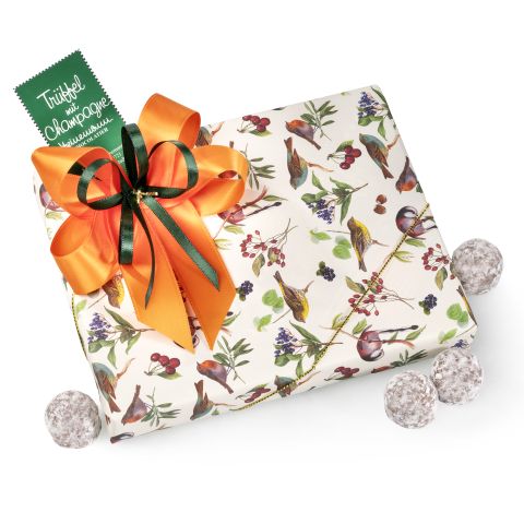 Pralines assortment in autumn design wrapping