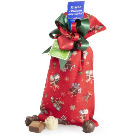 Fabric with Christmas design with non alcoholic sweets