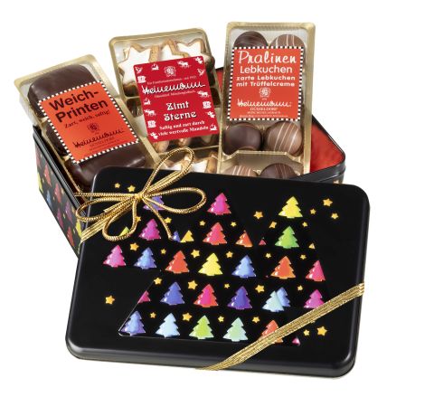 Die Schmuckdose Tannenbaum-Motiv mit Gebäck und Pralinen