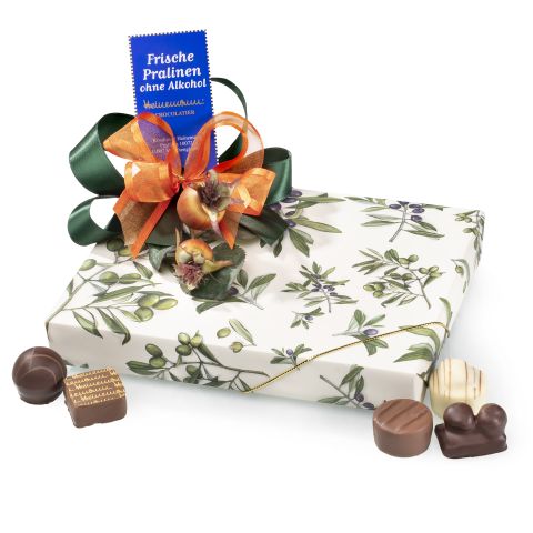 Pralines assortment in olive design wrapping, non-alcoholic