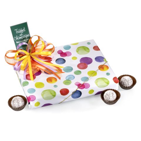 Schachtel in buntem Papier Trüffel mit Champagne